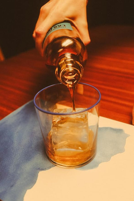 Las Olas Rum Being Poured On The Rocks