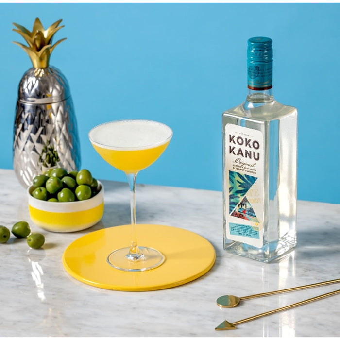 Koko Kanu Jamaican White Coconut Rum. Jamaican white rum with coconut flavour available in the UK. The strongest coconut rum available in the UK. Coconut rum cocktail with olives